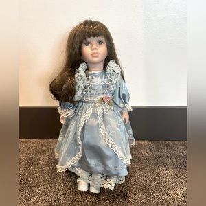 Porcelain doll blue dress